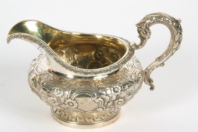 Lot 96 - A William IV silver cream jug of compressed...