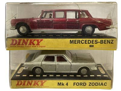 Lot 54 - A pair of cased Dinky cars, to include:  - Mk...