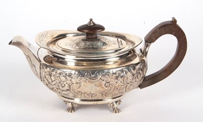 Lot 97 - A George III silver teapot of oval form and...