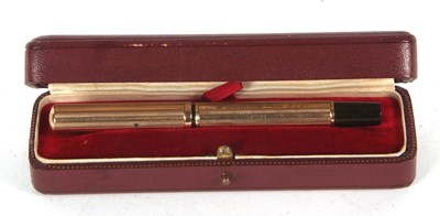 Lot 131 - A Watermans Ideal 9ct gold cased fountain pen,...