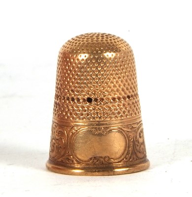 Lot 150 - A vintage yellow metal thimble (a/f) tests for...