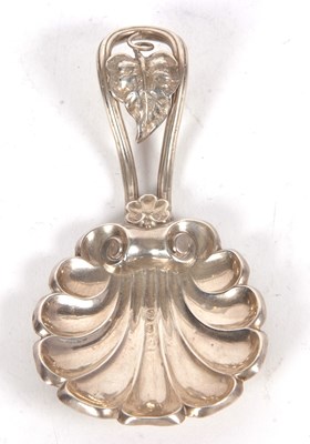 Lot 155 - A Victorian silver caddy spoon with a large...