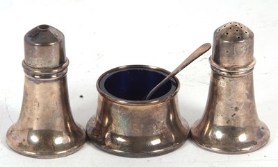 Lot 172 - A Elizabeth II silver three piece condiment...