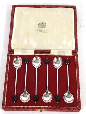 Lot 176 - Cased set of six Elizabeth II silver bean end...