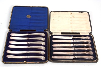 Lot 180 - A cased set of six silver pistol handled...