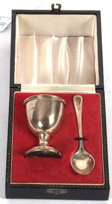 Lot 190 - A cased Christening egg cup and spoon,...