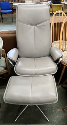 Lot 221 - An Ekorne grey leather armchair and...