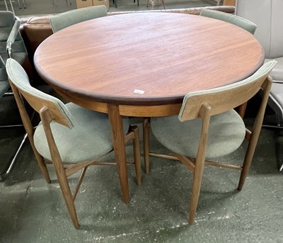 Lot 222 - A G-Plan teak extending dining table and four...