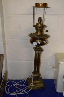 Lot 2 - A brass former oil lamp converted to electricity