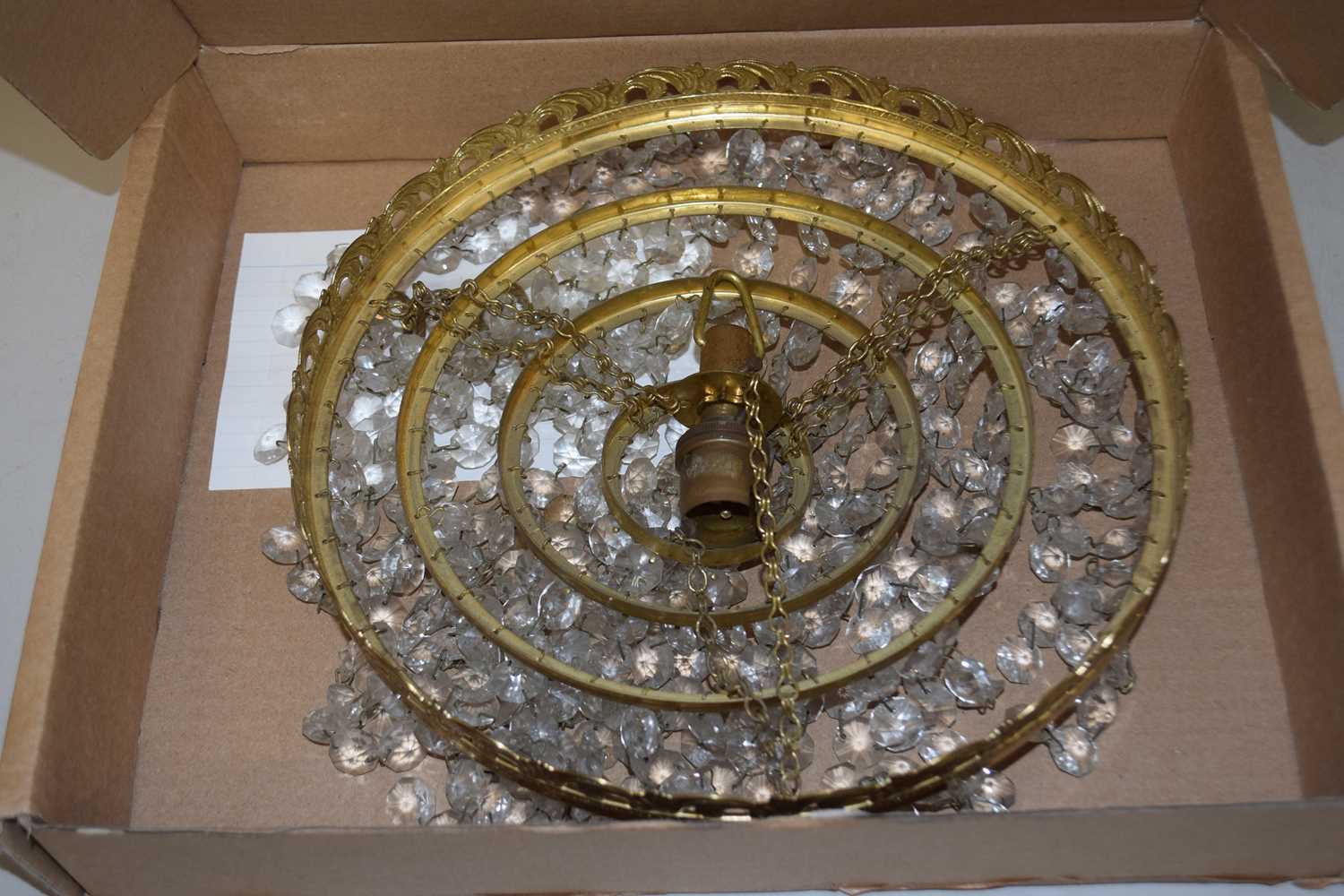 Lot 48 - A four tier circular ceiling light with glass...