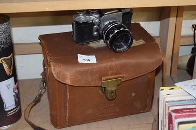 Lot 504 - An Edixa Reflex-B camera with leather case and...