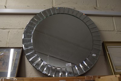 Lot 554 - A modern circular  wall mirror