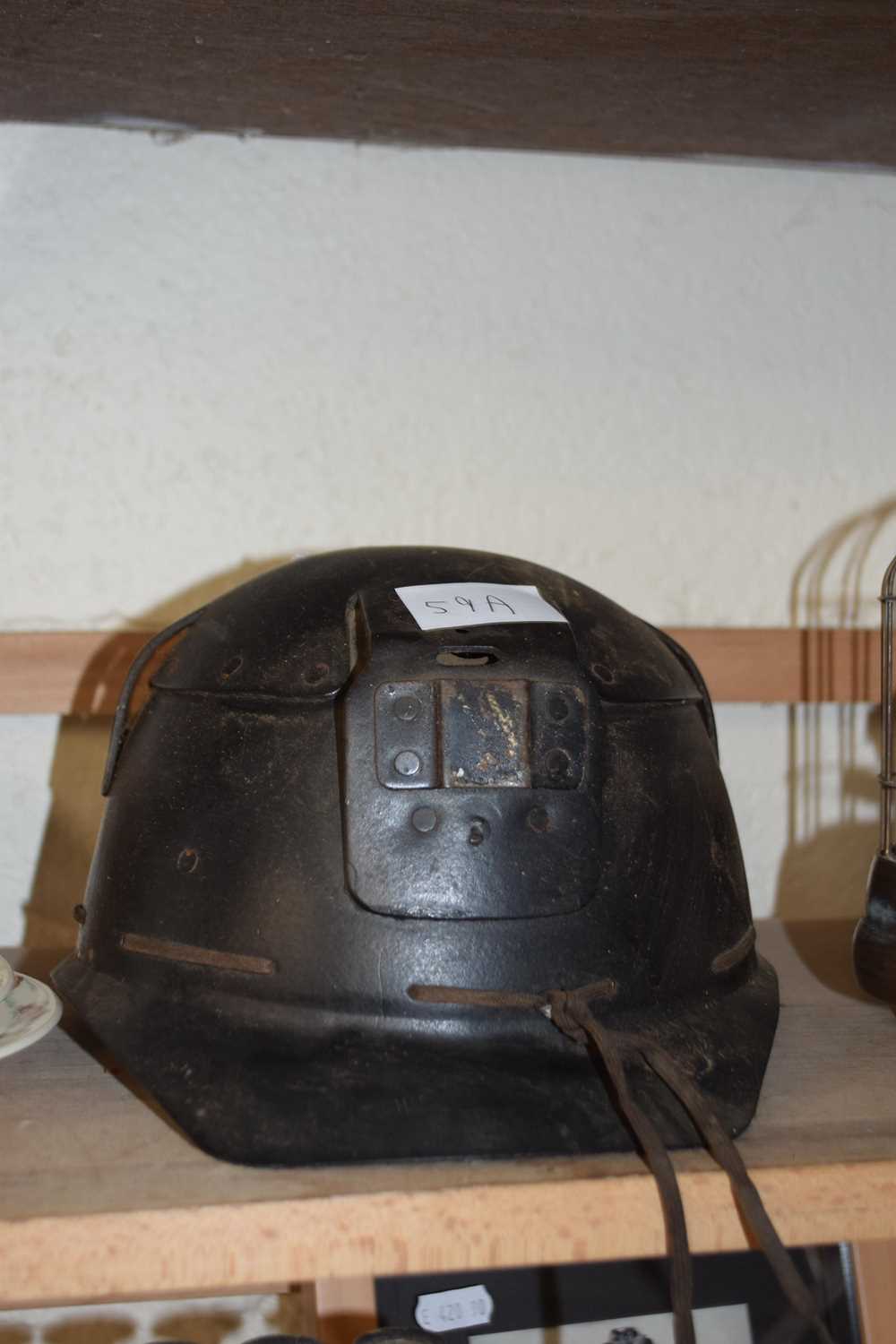 Lot 59 - A Welsh miners helmet