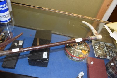 Lot 92A - A horn handled and silver mounted riding crop