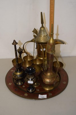 Lot 163 - A Middle Eastern brass coffee set together...