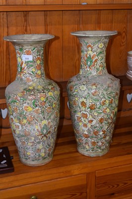 Lot 233 - A pair of large floral decorated vases,...