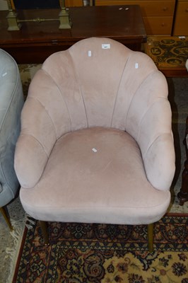 Lot 267 - Modern pink upholstered tub chair