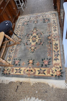 Lot 292 - A Chinese floral patterned carpet