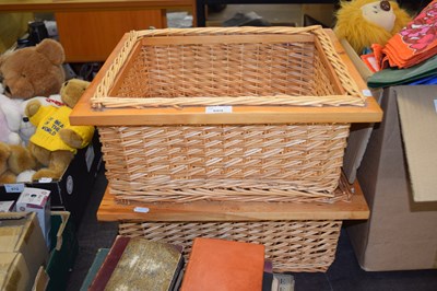 Lot 669 - Two wicker baskets with wooden frames