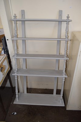 Lot 754 - A painted shelf unit