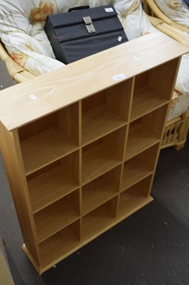 Lot 857 - A modern light wood shelf unit