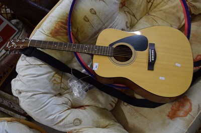 Lot 860 - A Yamaha acoustic guitar