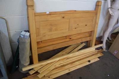 Lot 877 - A pine double bed frame