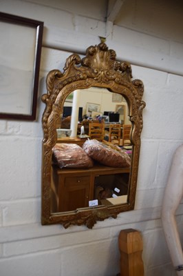 Lot 879 - A wall mirror in gilt finish frame