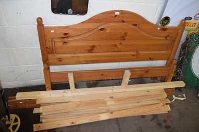 Lot 885 - A pine double bed frame