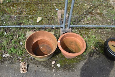 Lot 1128 - Three terracotta plant pots