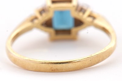 Lot 30 - An 18ct topaz and diamond ring, the...