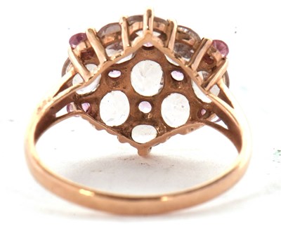 Lot 32 - A 9k pink gemset cluster ring, comprised of...