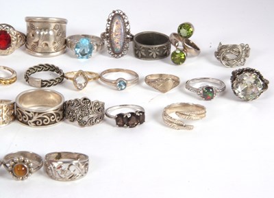 Lot 137 - A quantity of silver, white metal and gemset...