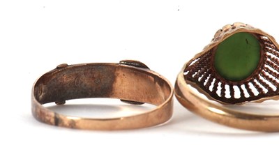 Lot 33 - Three rings, to include a 9ct buckle ring...