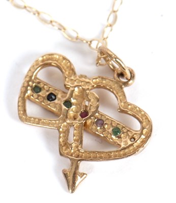 Lot 73 - An acrostic heart necklace, the double heart...