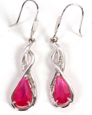 Lot 57 - A pair of 14ct ruby and diamond earrings, the...