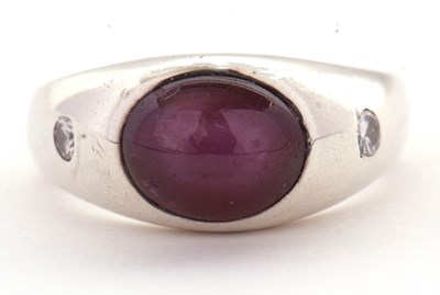 Lot 2 - A star ruby and diamond ring, the oval...