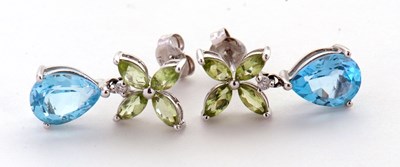 Lot 124 - A suite of 14k topaz, peridot and diamond...