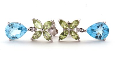 Lot 124 - A suite of 14k topaz, peridot and diamond...