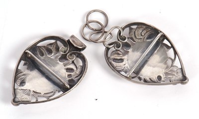 Lot 134 - An Arts & Crafts buckle, the leaf shaped...