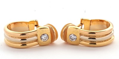 Lot 364 - A pair of Cartier 18ct diamond set earclips,...