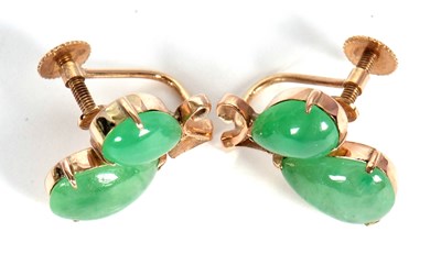 Lot 98 - A pair of jade earrings and brooch, the...