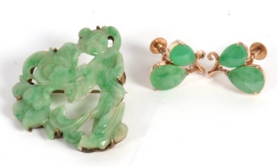 Lot 98 - A pair of jade earrings and brooch, the...