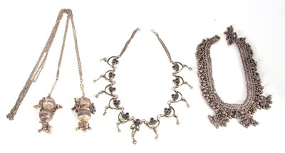 Lot 145 - Three Eastern metalware necklaces, all in...