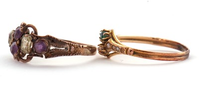Lot 39 - Two gemset rings, to include a peridot and...