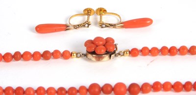Lot 92 - Two coral bead necklaces and a pair of...