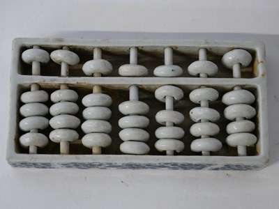 Lot 255 - Chinese porcelain abacus in rectangular frame...