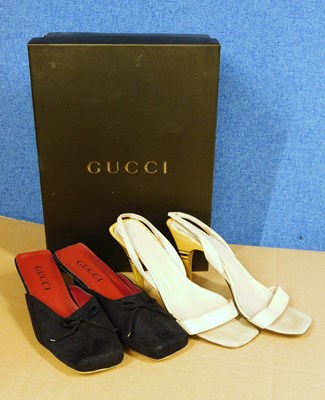 Lot 144 - Two pairs of Gucci shoes, to include a pair of...