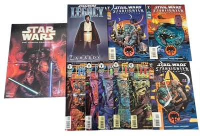 Lot 20 - A selection of Star Wars comics and guides, to...