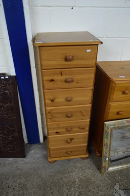 Lot 375 - MODERN PINE PEDESTAL CHEST OF SEVEN DRAWERS,...